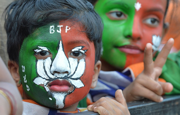 Symbol of BJP painted on childran's face