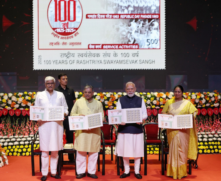 Narendra Modi launching postal ticket and coin on commemoration of 100 years of RSS 