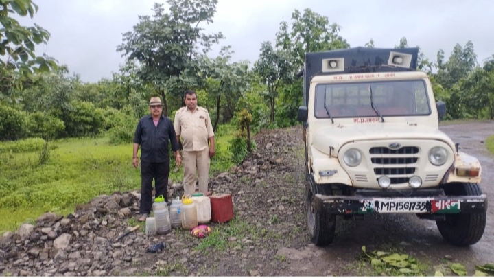 Snake catcher Akhol Baba releasing snake with forest guards