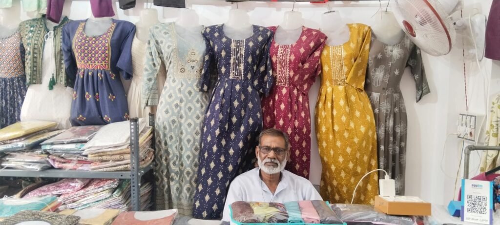 Chhuttan Khan, who used to work in fairs now runs a garment shop in Dungarpur, Rajasthan 